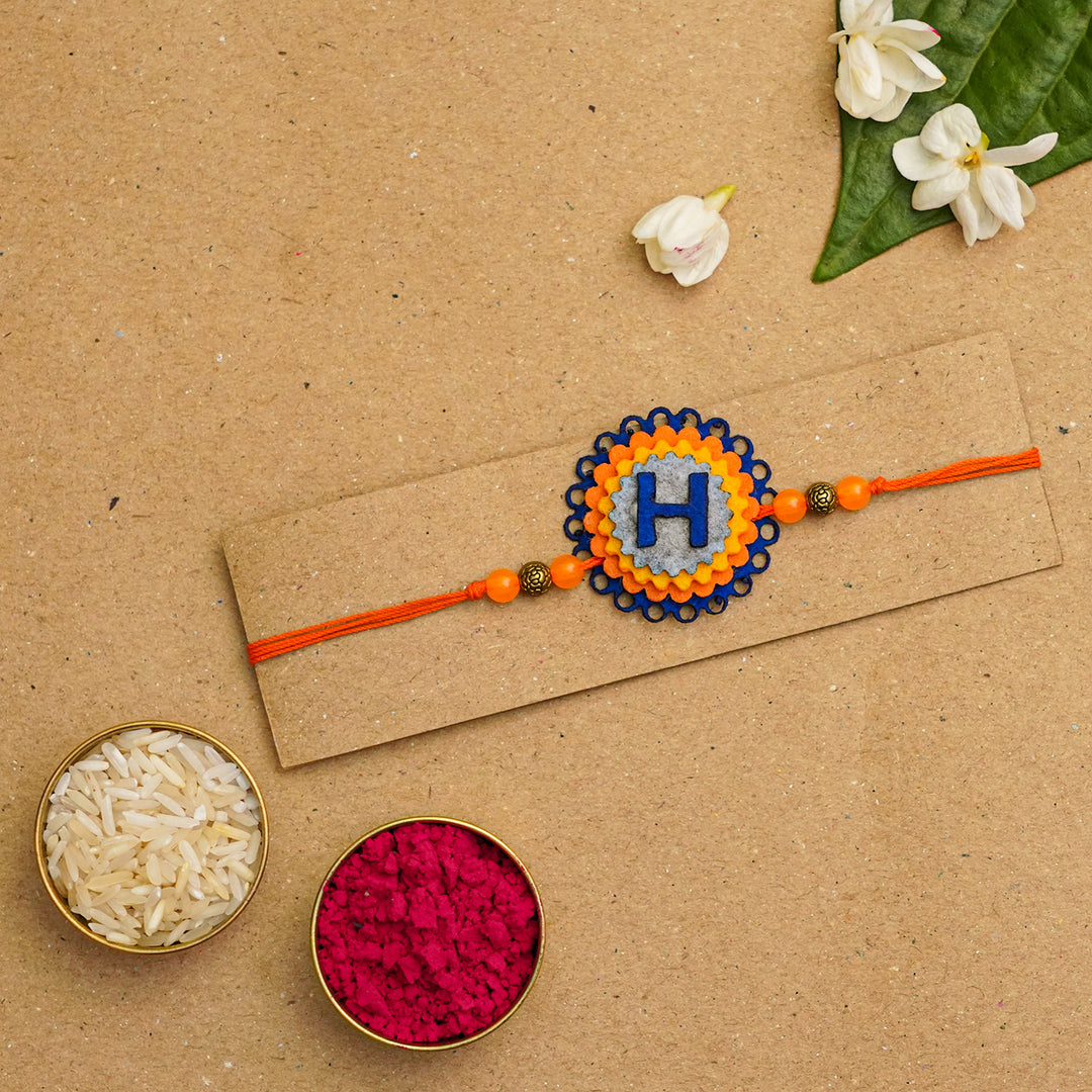 Personalized Handmade Felt Rakhi With Roli Chawal - Flat Lay with Accessories (6)