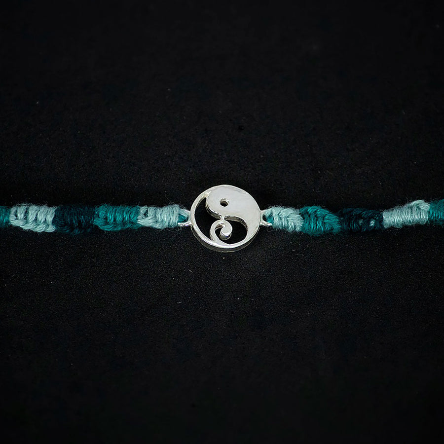 Handmade Gajanana 925 Silver Rakhi With Roli Chawal For Brother - Close-up of Pendant Detail