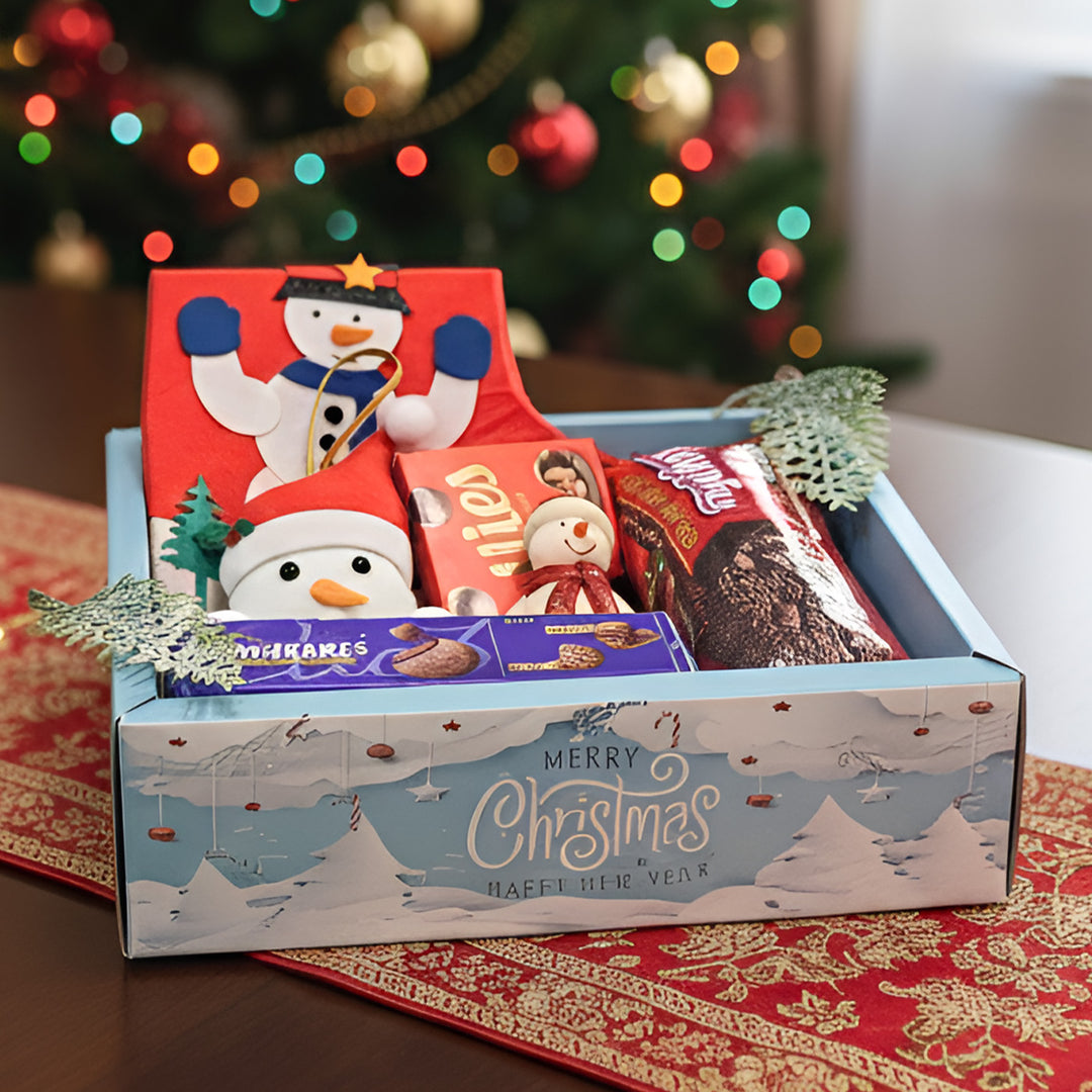Personalized Christmas Gift Hamper | Includes 1 Ornament, 1 Stocking, 1 Snowman Candle, 1 Brownie Cake, 1 Cadbury Chocobakes, 1 Nutties Pack
