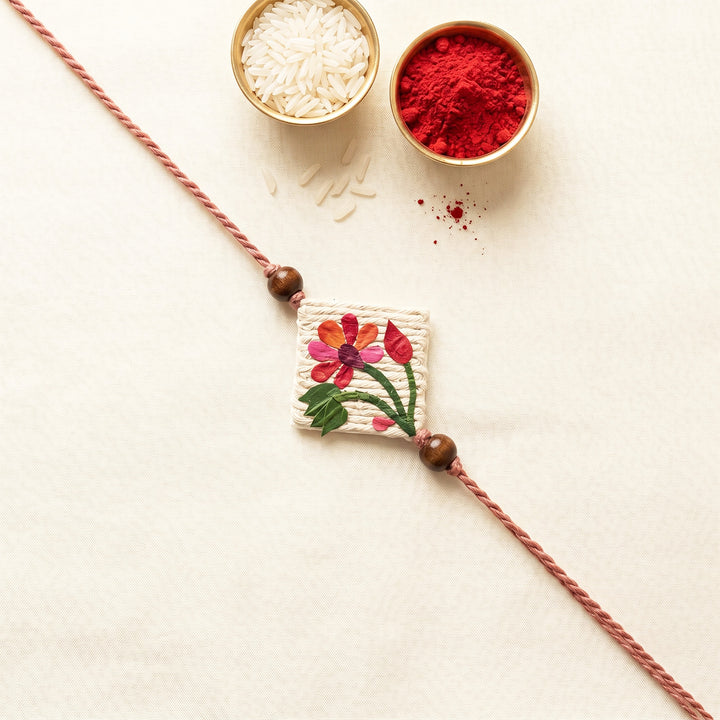 Handmade Pressed Flower Art Lotus Jute Rakhi With Roli Chawal For Bhaiya