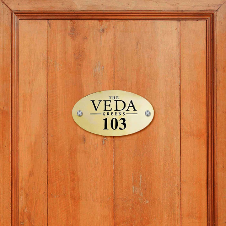 Personalized Waterproof Oval Golden Metal Name Plate - Mounted on Wooden Door Centered