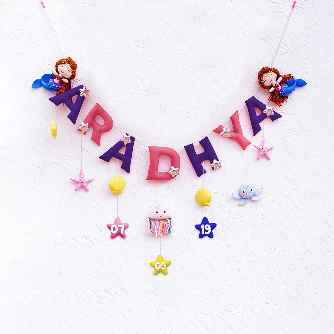 Handcrafted Personalized Themed Bunting For Kids Mystique Mermaid - Front View Hanging Against Wall