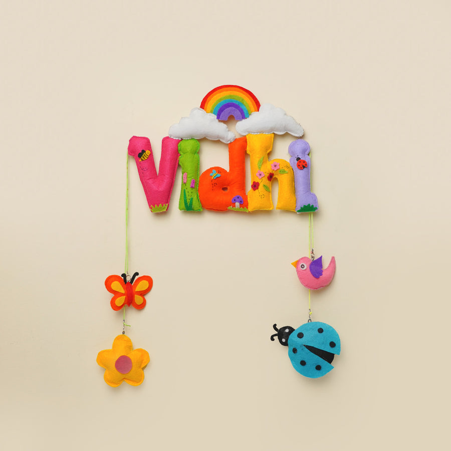 Personalized Rainbow And Garden Theme Felt Kids Name Plate - Front View Hanging on Wall