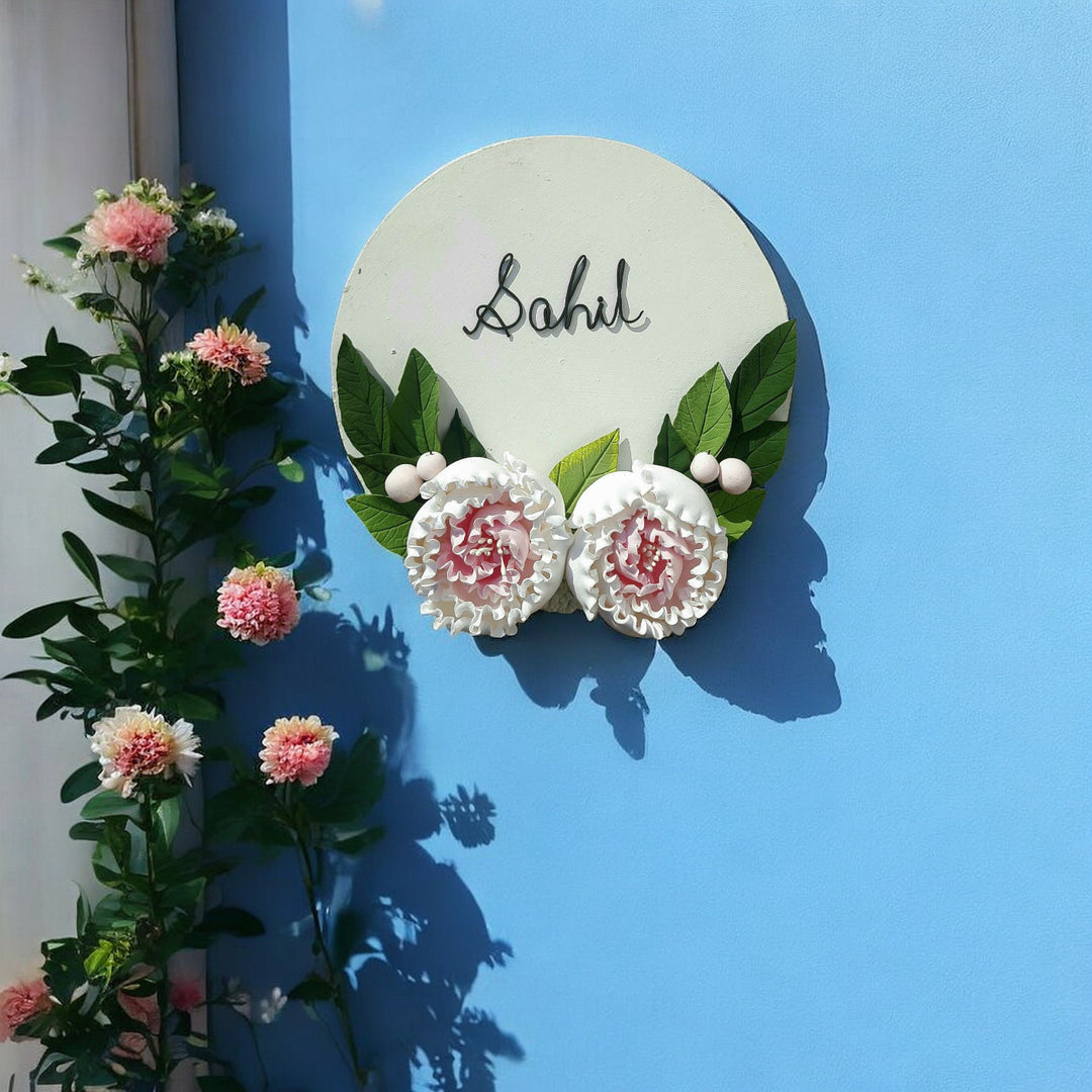 Personalized Round Floral Peony Theme Deco Clay Name Plate - Mounted on Blue Wall with Flowers