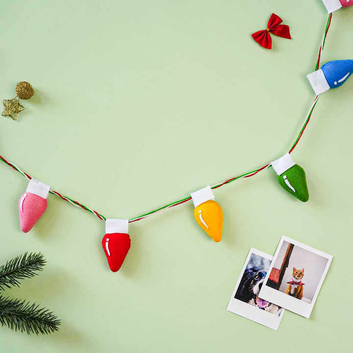 Handmade Felt String Of Felt Light Bulbs Christmas Ornament - Close-up of Hanging String Lights