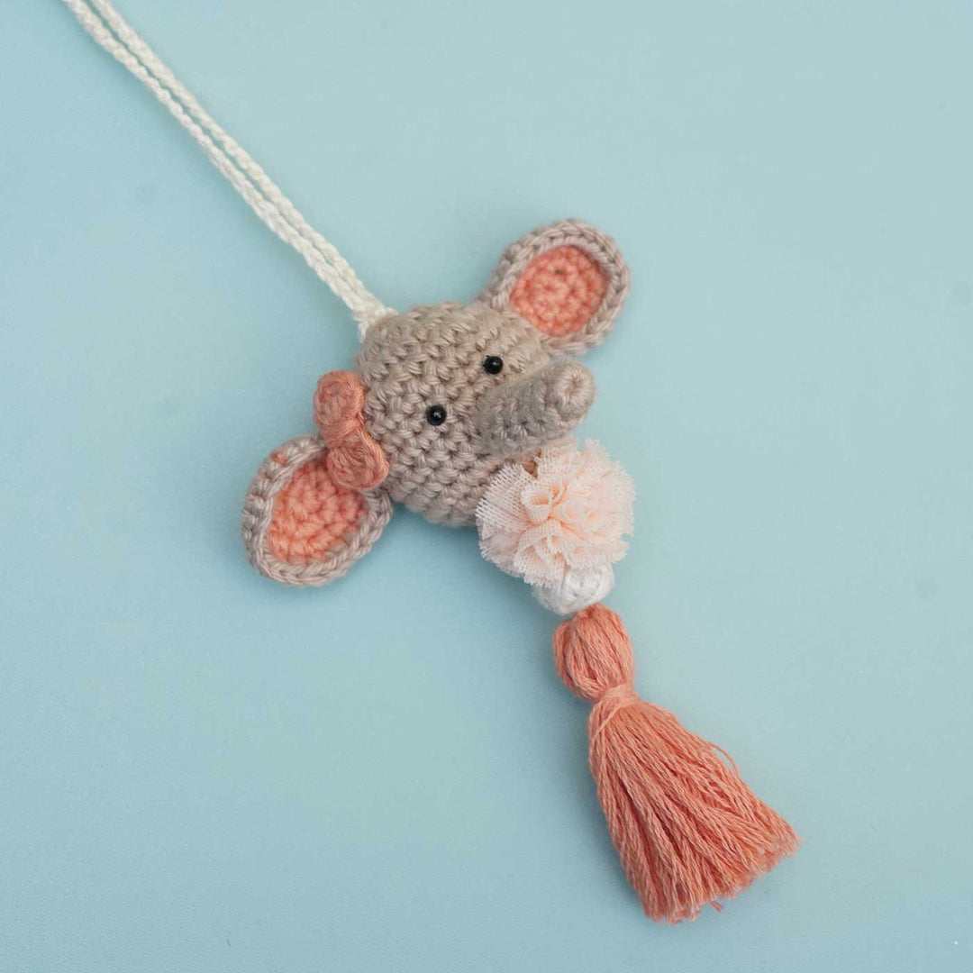 Handmade Crochet Dumbo Kids Rakhi With Roli Chawal - Multiple Products on Display Stand