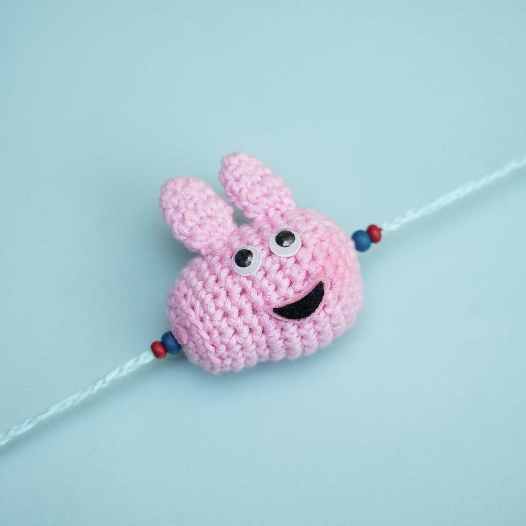 Handmade Crochet Peppa Pig Kids Rakhi With Roli Chawal - Close-up of Crochet Bunny Bracelet