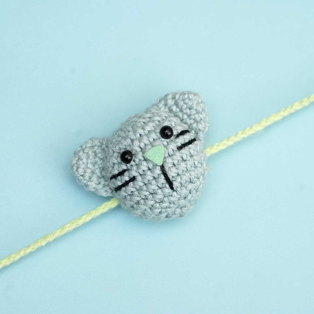 Handmade Crochet Kitty Kisses Kids Rakhi With Roli Chawal - Close-up Front View