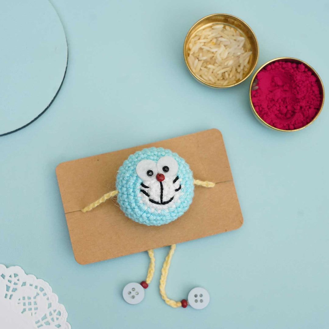 Handmade Crochet Doraemon Kids Rakhi With Roli Chawal - Charm on Card Display