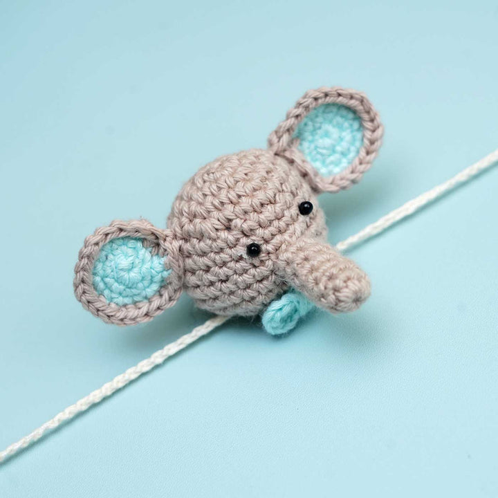 Handmade Crochet Dumbo Kids Rakhi With Roli Chawal - Close-up Single Elephant Head