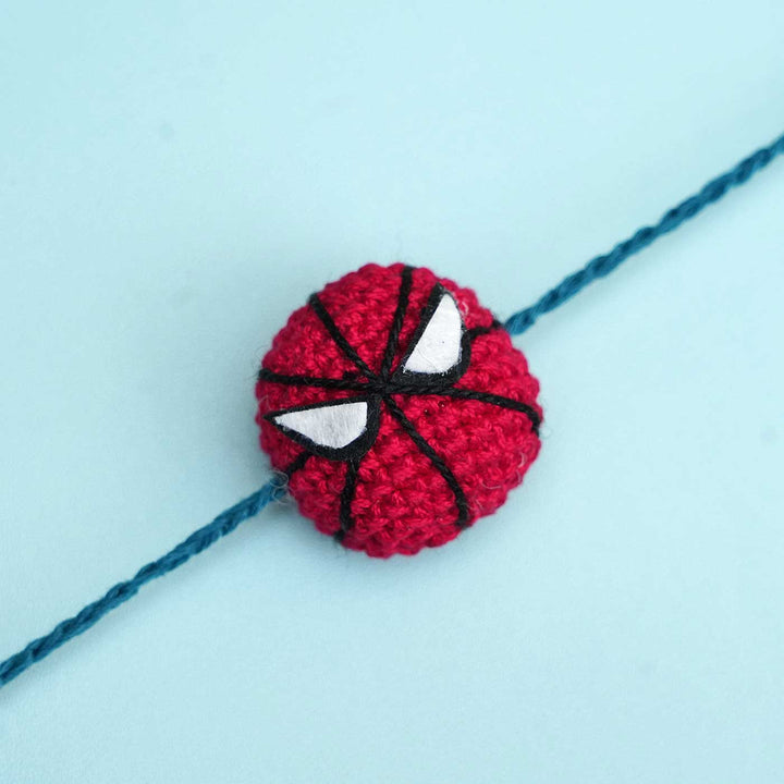 Handmade Crochet Spiderman Kids Rakhi With Roli Chawal - Close-up Front View