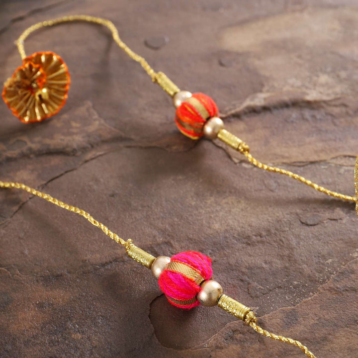 Handmade Beaded Jhilmil Gota Rakhi With Roli Chawal Set Of 2 - Close-up of decorative beads