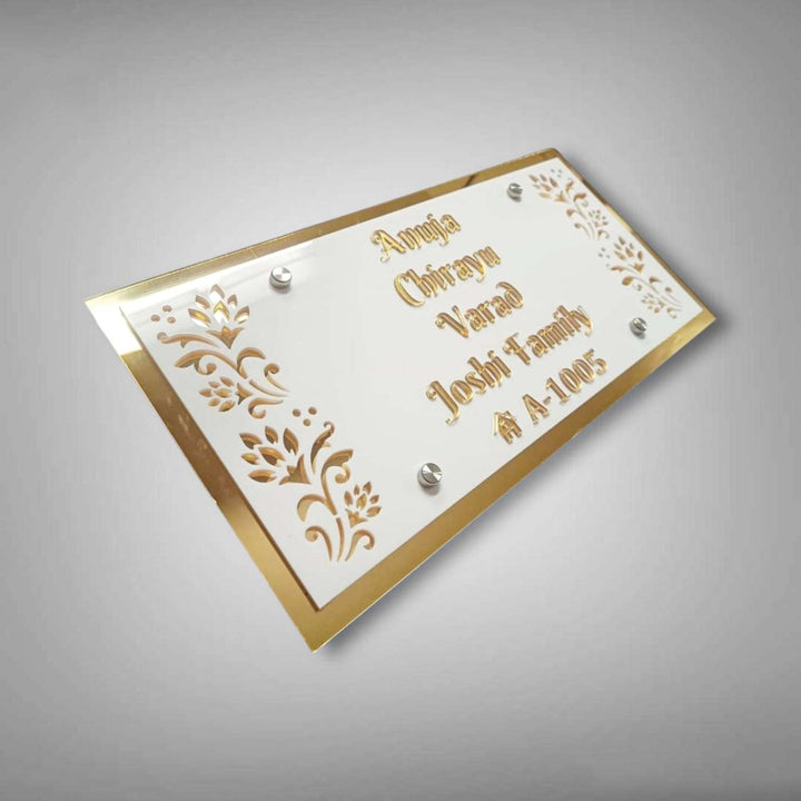 Personalized White And Gold Floral Theme Acrylic Name Plate - Angled Front View on Surface