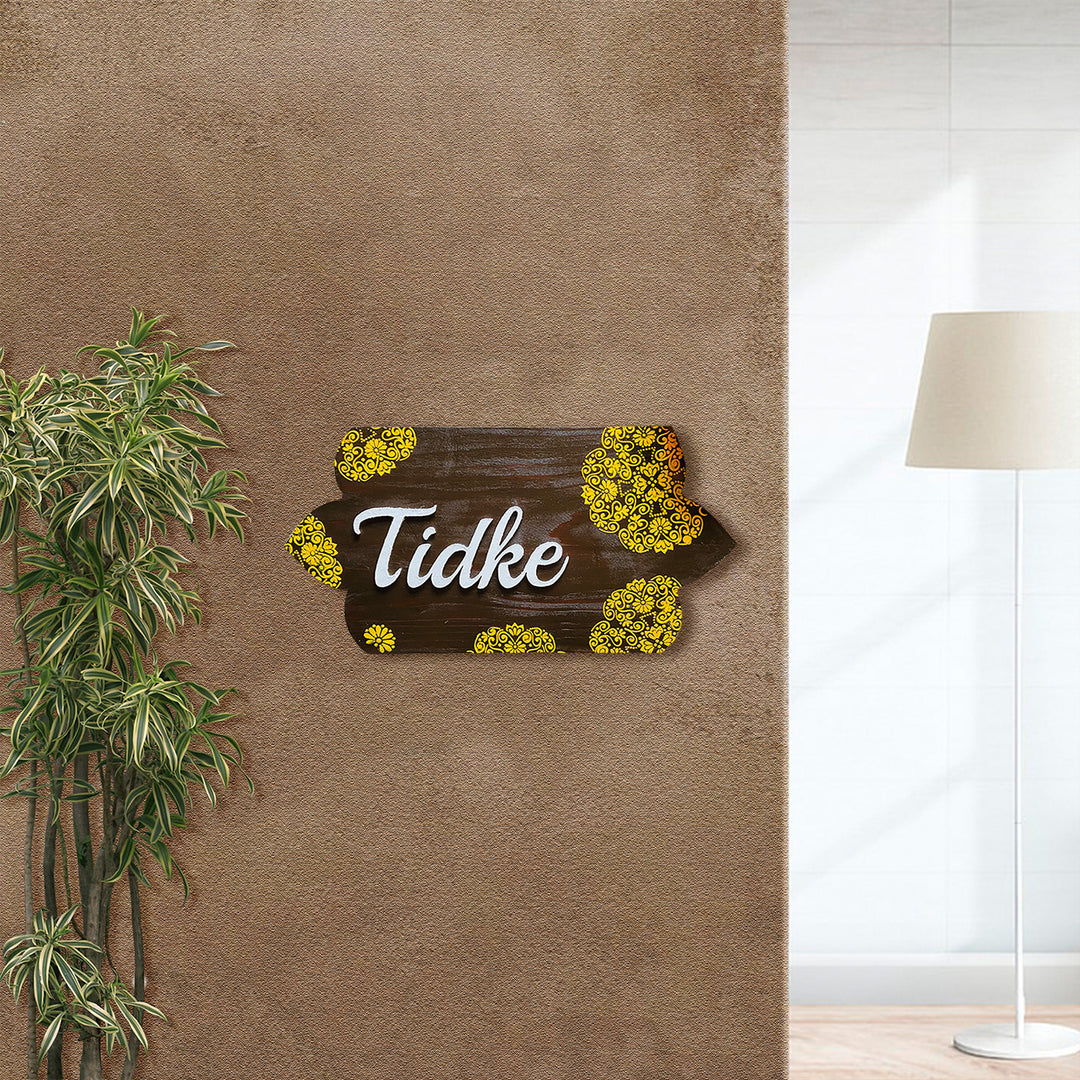 Handcrafted Personalized Curvy Pinewood Textured Name Plate - Mounted on Wall with Surroundings