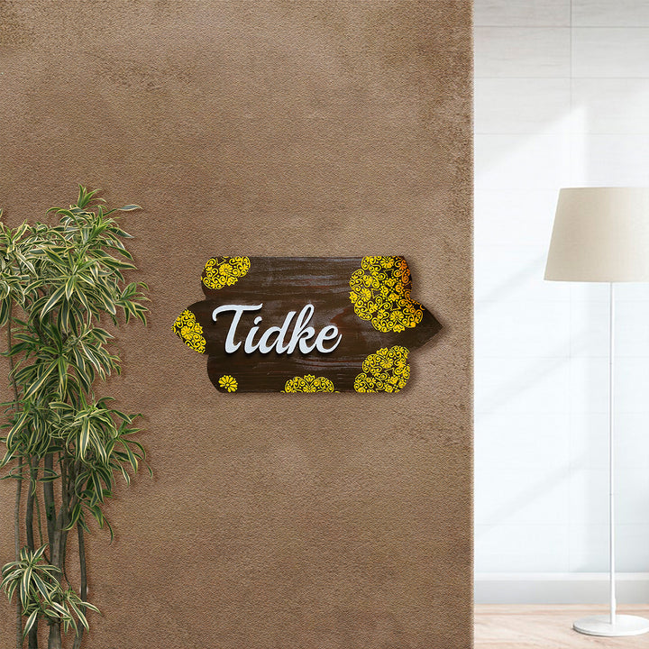 Handcrafted Personalized Curvy Pinewood Textured Name Plate - Mounted on Wall with Surroundings