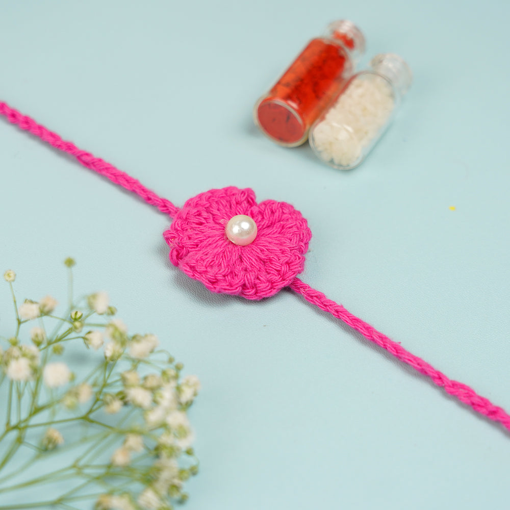 Handmade Crochet Scarlet Knot Rakhi With Roli Chawal For Brother - Straight Length Display
