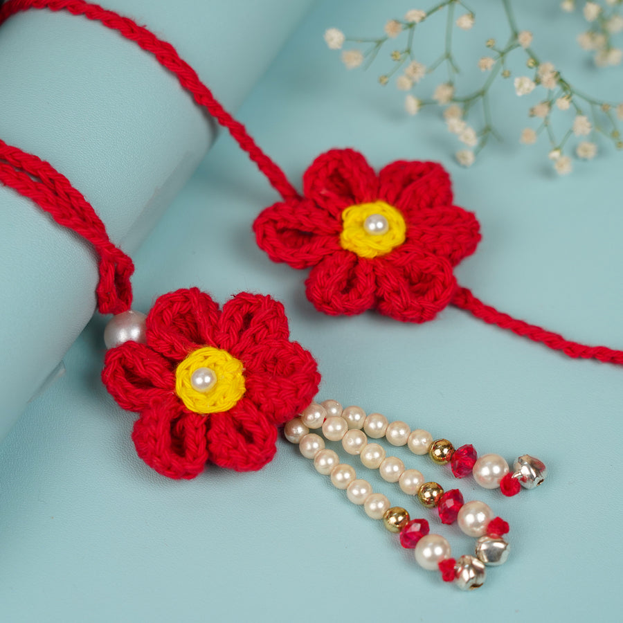 Customized Handmade Crochet Rubi Petal Floral Bhaiya Bhabhi Rakhi With Roli Chawal - Close-up of crocheted flower pairs