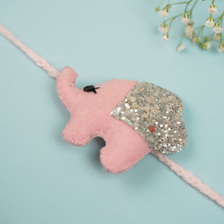 Handmade Glitter Elephant Felt Rakhi With Roli Chawal - Pink Elephant Rakhi Side Angle