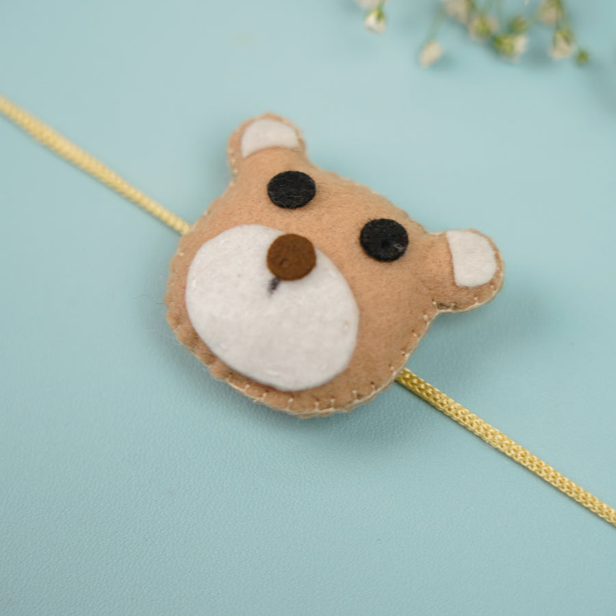 Handmade Teddy Theme Felt Rakhi With Roli Chawal - Close-up on Bear Face Rakhi