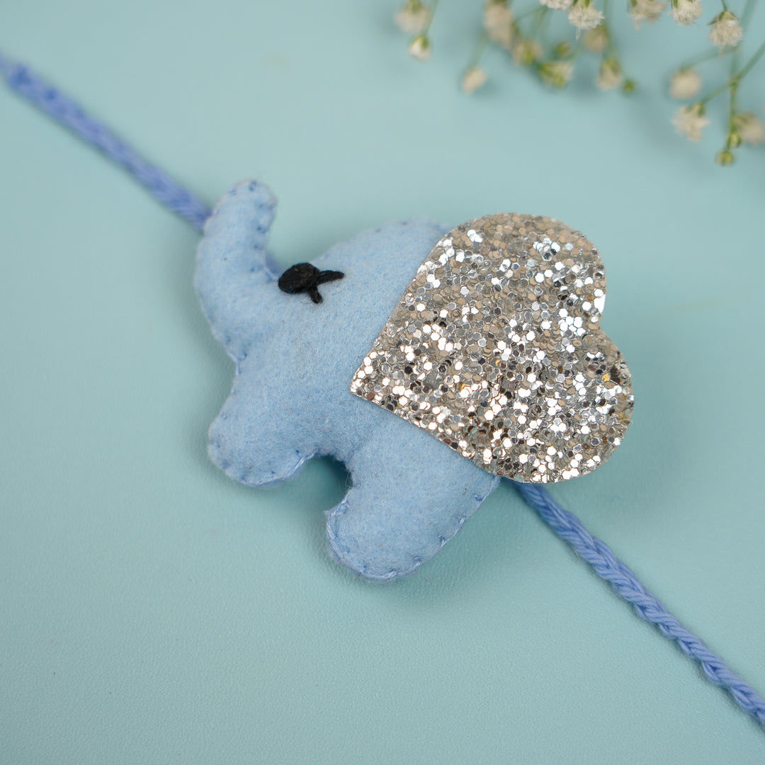 Handmade Glitter Elephant Felt Rakhi With Roli Chawal - Blue Elephant Rakhi Close-up