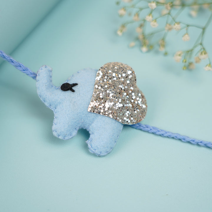 Handmade Glitter Elephant Felt Rakhi With Roli Chawal - Blue Elephant Rakhi Close-up (7)