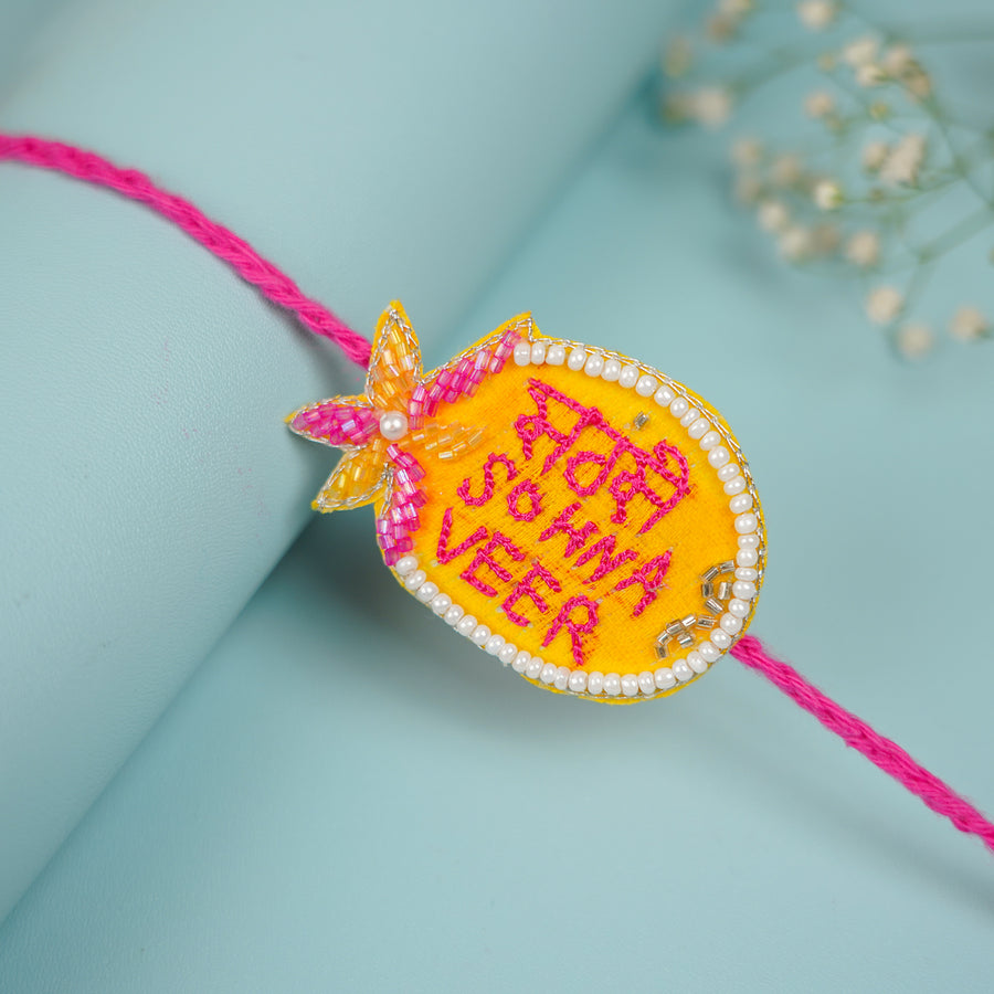 Handmade Beaded Sabse Sona Veer Rakhi With Roli Chawal For Brother - Close-up of Rakhi detail