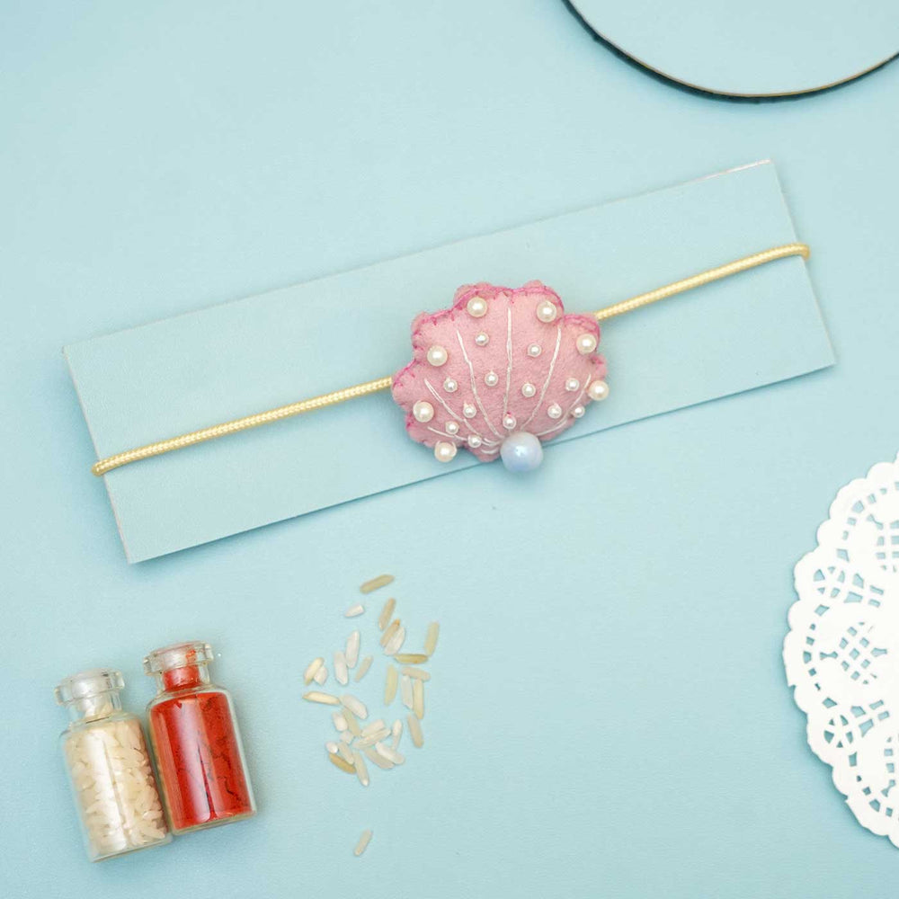 Handmade Seashell Felt Rakhi With Roli Chawal - Bracelet on Packaging Card