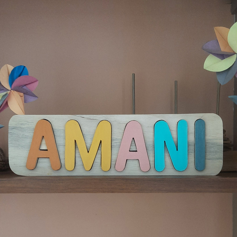 Personalized Wooden Name Puzzle - Front View on Shelf Display