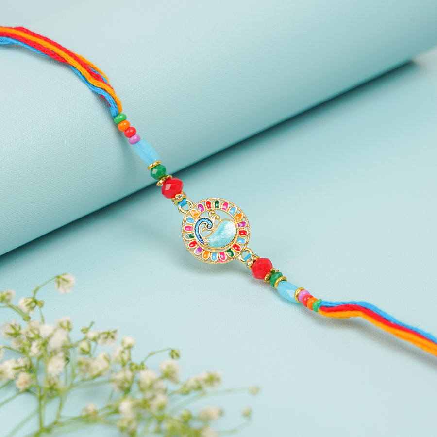 Handmade Multicolor Peacock Jadtar Rakhi With Roli Chawal - Close-up of Design and Thread
