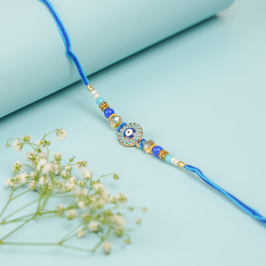 Handmade Beaded Evil Eye Rakhi With Roli Chawal 3 - Flat Lay View