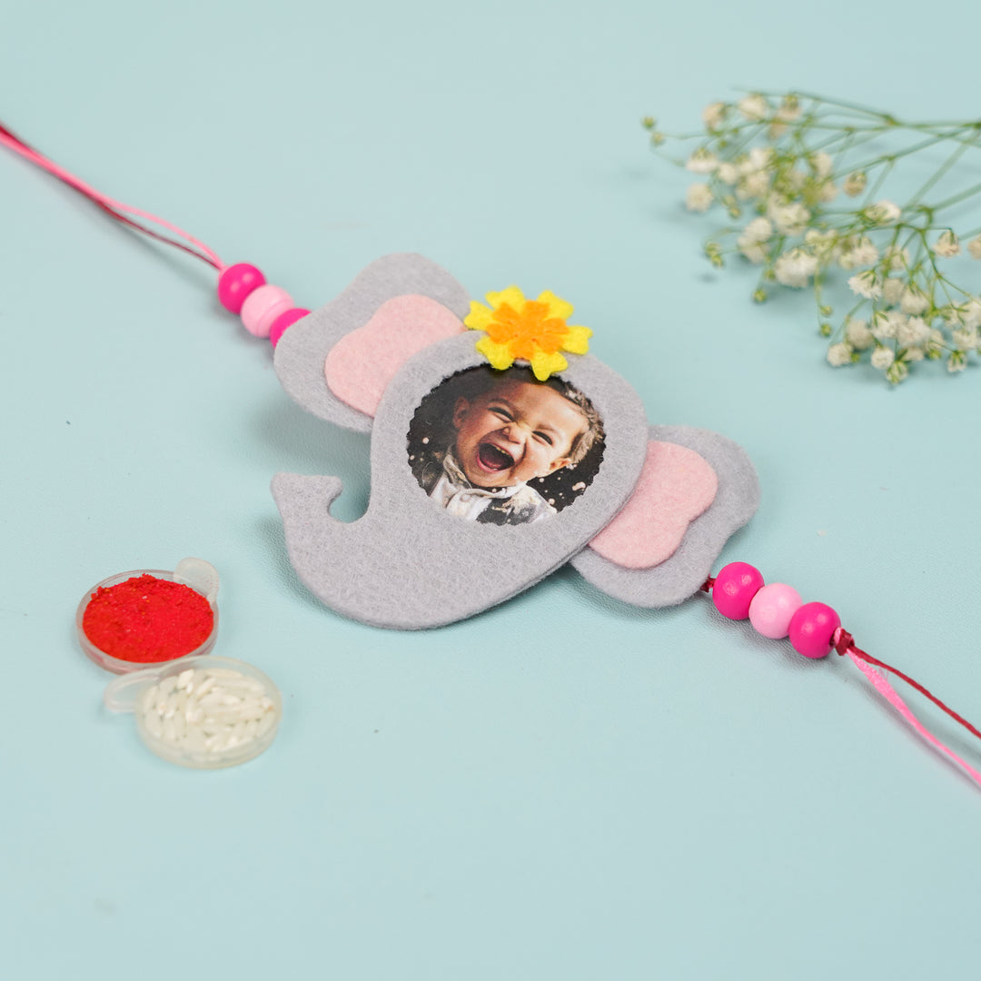 Photo Personalized Resuable Beaded Elephant Theme Felt Kids Rakhi With Roli Chawal - Top View with Decorative Elements