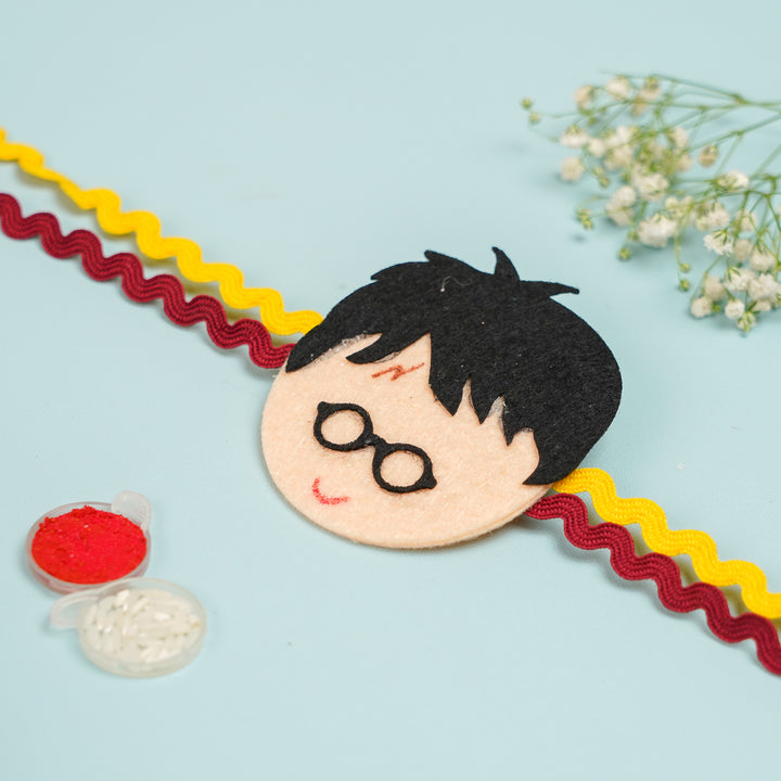 Handmade Harry Potter Theme Felt Kids Rakhi With Roli Chawal - Top View with Decorative Items