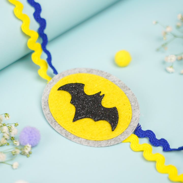 Handmade Batman Theme Felt Kids Rakhi With Roli Chawal 2 - Close-up Front View