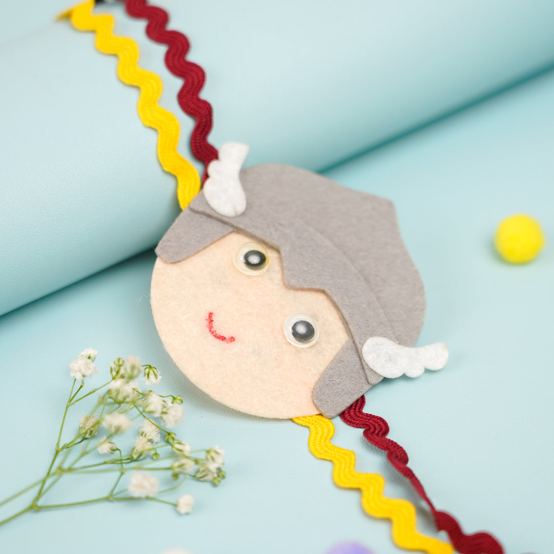 Handmade Thor Theme Felt Kids Rakhi With Roli Chawal - Front View Close-up