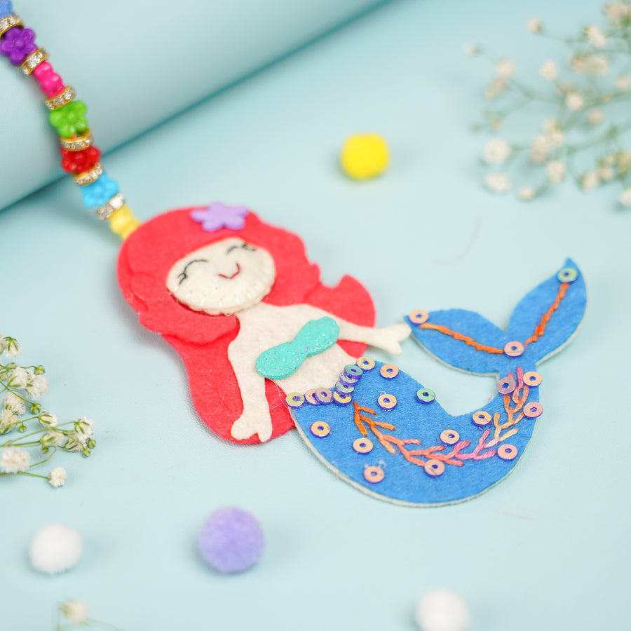 Handmade Mermaid Theme Felt Kids Lumba Rakhi For Girls With Roli Chawal - Close-up View