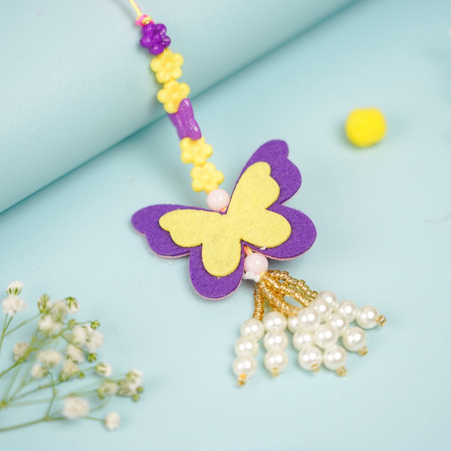 Handmade Buttefly Theme Felt Kids Lumba Rakhi For Girls With Roli Chawal - Close-up of Pendant Detail