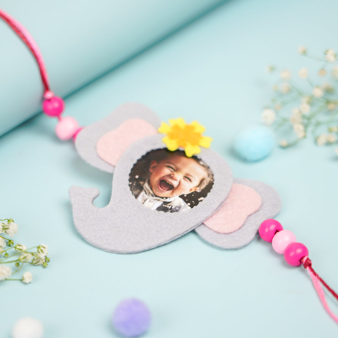 Photo Personalized Resuable Beaded Elephant Theme Felt Kids Rakhi With Roli Chawal - Close-up of Photo Frame Ornament