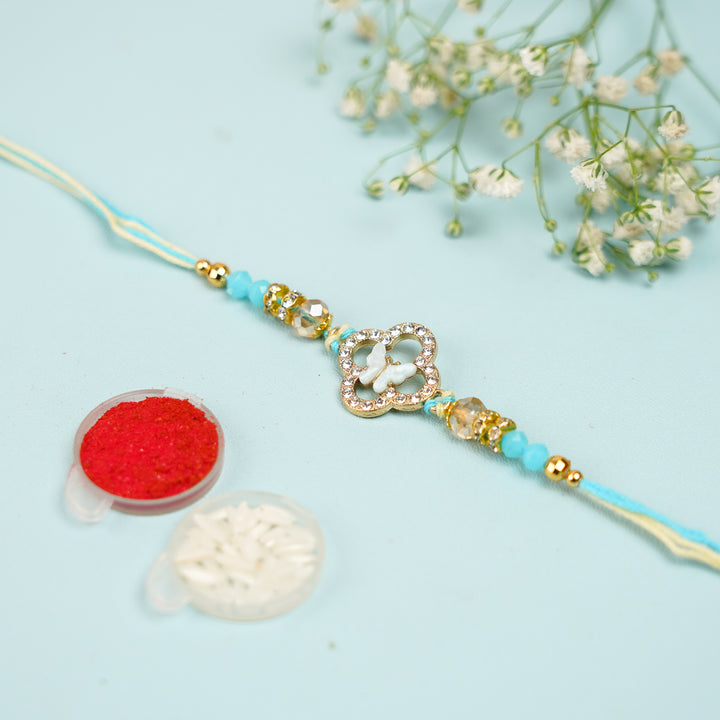 Handmade Buttefly Theme Rakhi With Roli Chawal - Blue Bracelet with Roli and Rice Containers