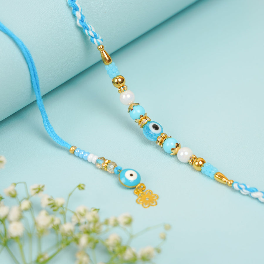 Handmade Beaded Blue Evil Eye Bhaiya Bhabhi Rakhi With Roli Chawal Set Of 2 - Pair Top View with Accessories