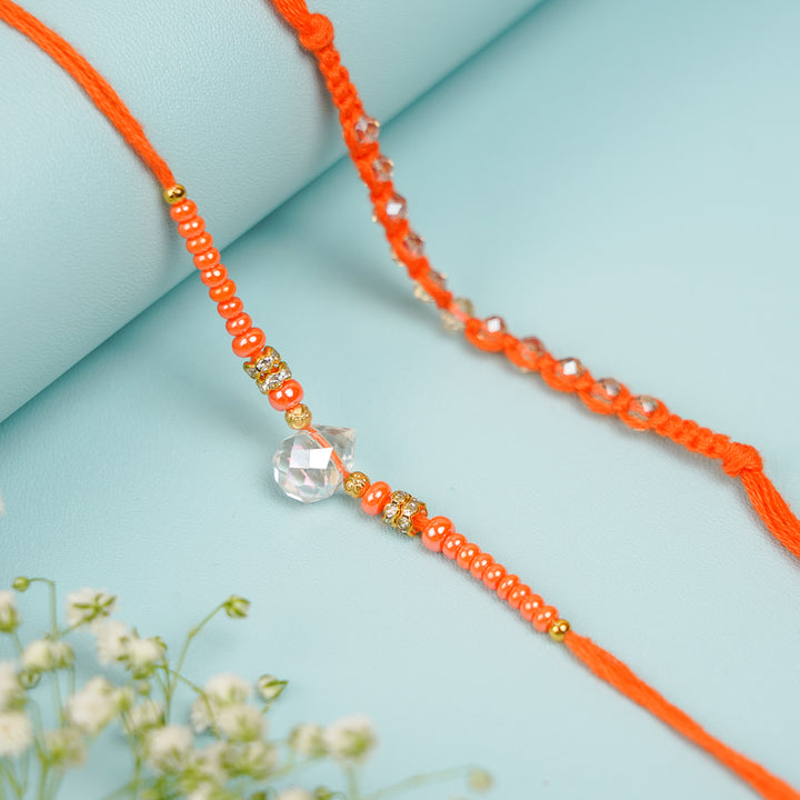 Handmade Jadtar Crystal Bhaiya Bhabhi Rakhi With Roli Chawal Set Of 2 - Close-up of bead centerpiece