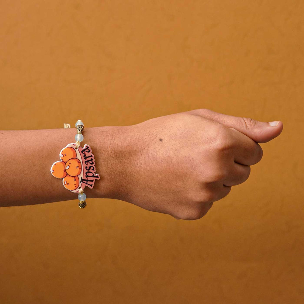 Personalized Handmade Laddu Acrylic Kids Rakhi With Roli Chawal - Worn on wrist
