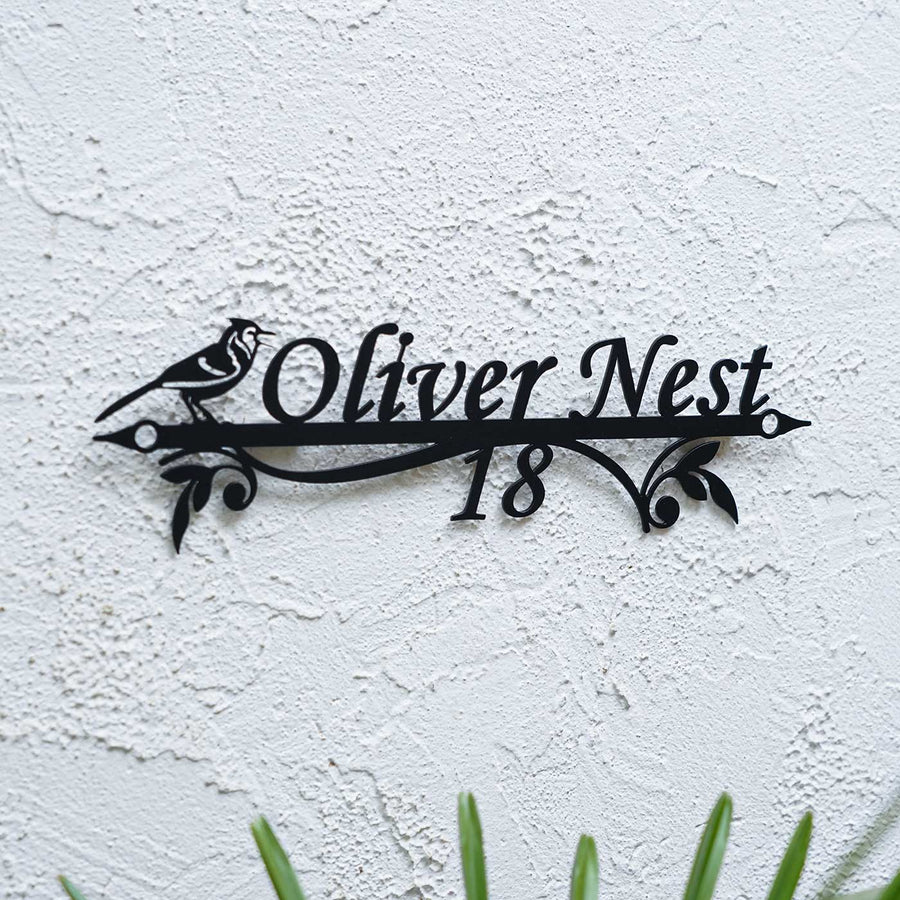 Personalized Weatherproof Bird Themed Metal Name Plate With House Number - Mounted on Textured Exterior Wall
