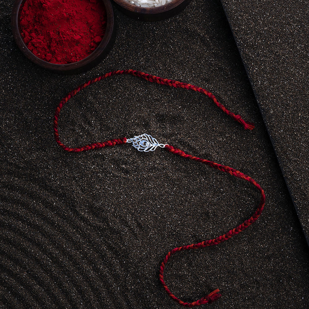 Handmade Peacock 925 Silver Rakhi With Roli Chawal For Brother - Full Product Layout on Surface