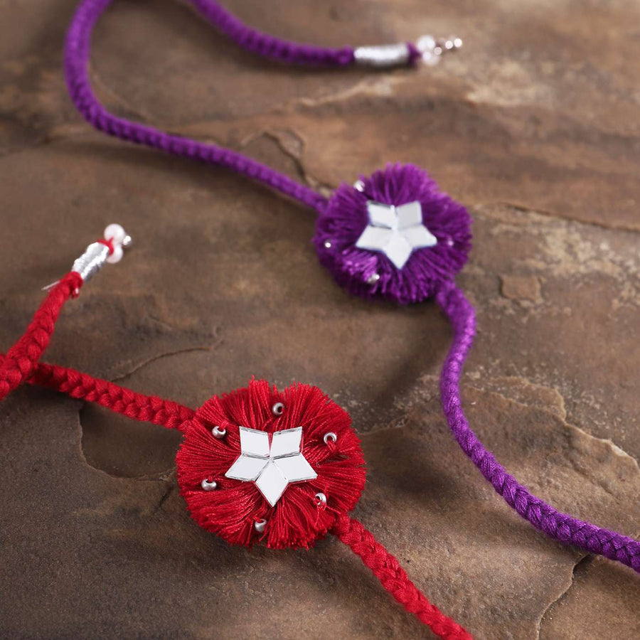 Handmade Mirror Work Floral Rakhi With Roli Chawal Set Of 2 - Close-up of Embellished Center