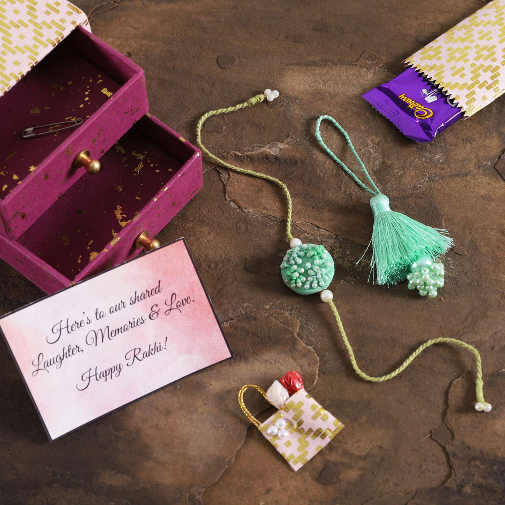 Handmade Moti Tassel Rakhi Hamper With Chocolates And Roli Chawal For Bhaiya And Bhabhi - Contents Laid Out Outside Box