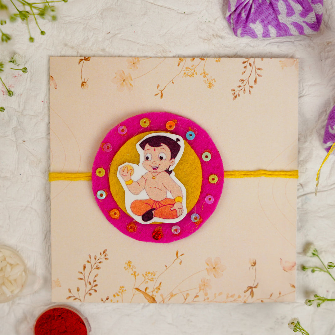 Handmade Chota Bheem With Ladoo Rakhi With Roli Chawal - Front View with Packaging
