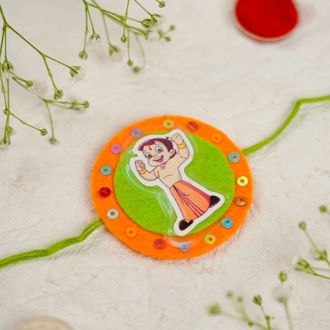 Handmade Chota Bheem Kids Rakhi With Roli Chawal - Close-up of Rakhi Design