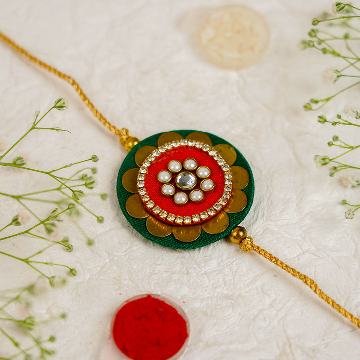 Handmade Mandala Kundan Flower Rakhi With Roli Chawal - Close-up Top View