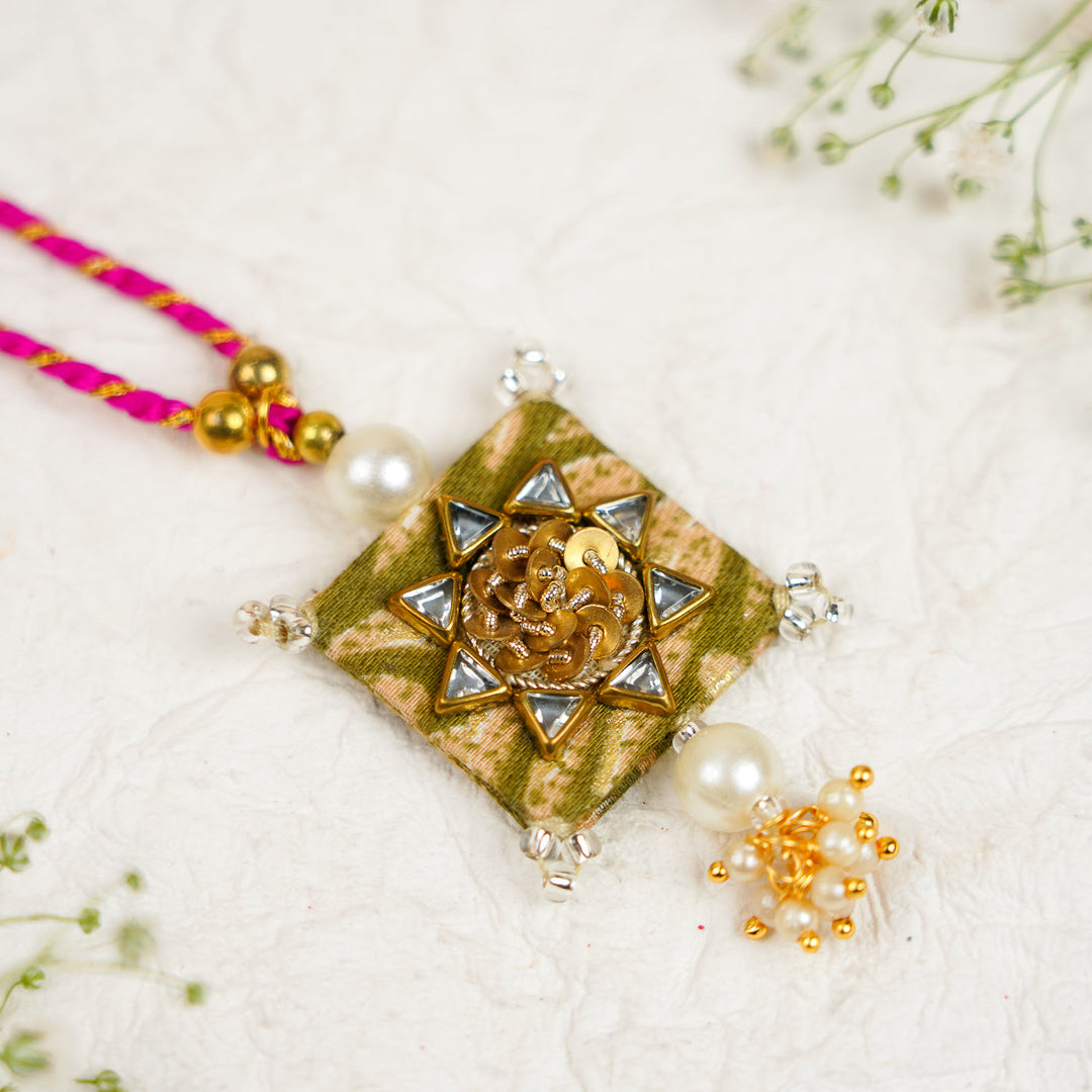 Handmade Sequin Embroidery Kundan Bhaiya Bhabhi Rakhi With Roli Chawal Set Of 2 - Close-up of Single Rakhi Pendant