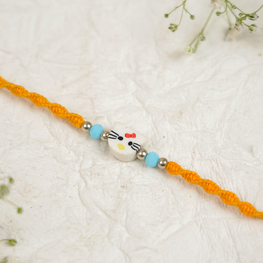 Handmade Hello Kitty Kids Rakhi With Roli Chawal - Close-up of Centerpiece Charm